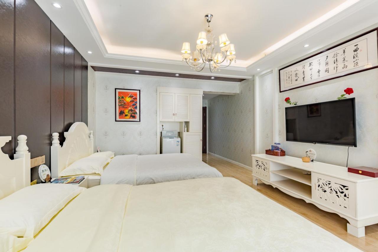 Doudou Meilan Fengqing Inn Jinghong Exteriör bild